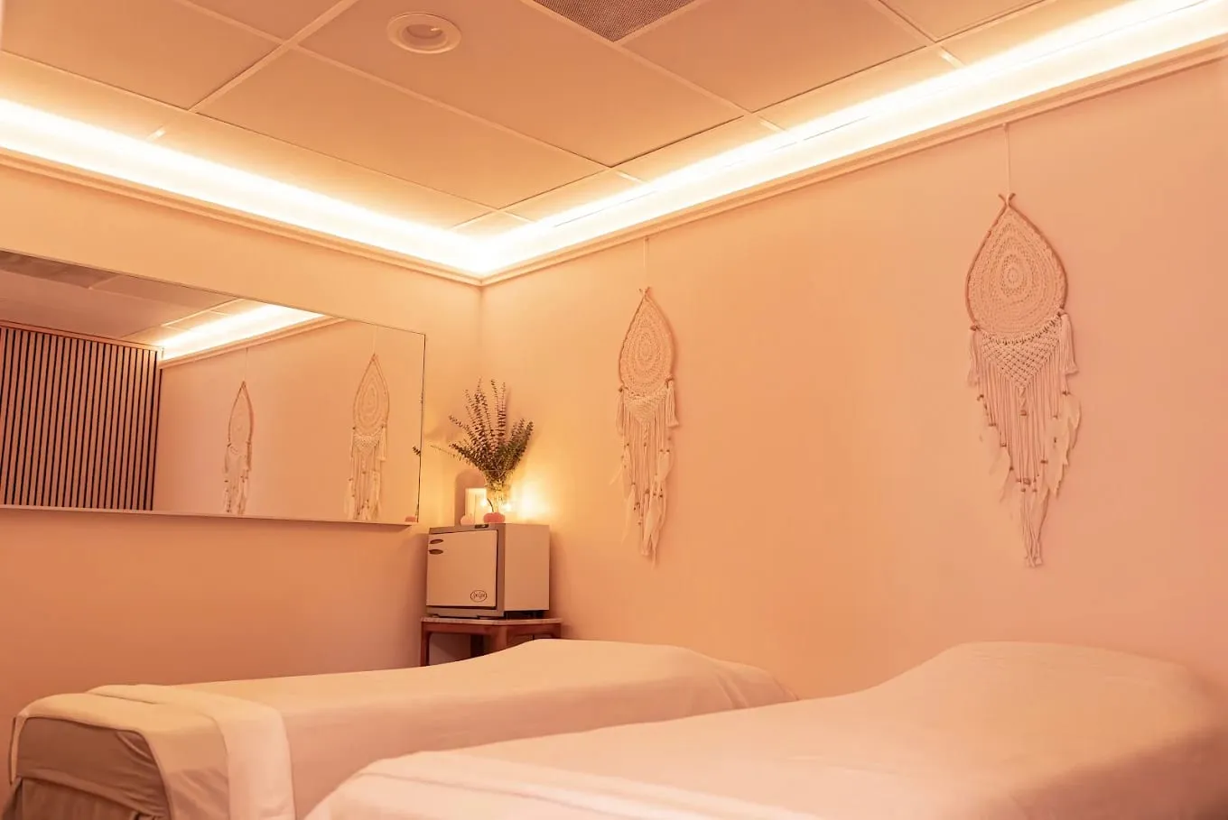 Couples suite with two oversized massage tables set side by side — Sweet & Smile Massage, Daly City